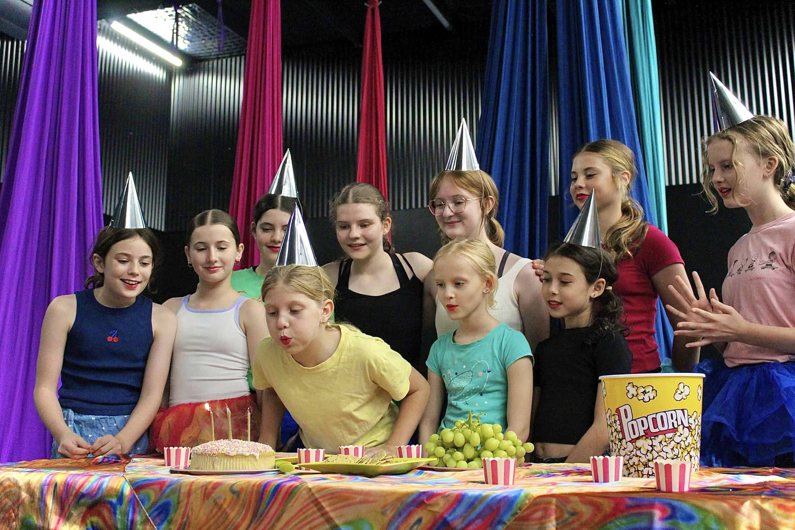 Children's circus birthday party, blowing out candles
